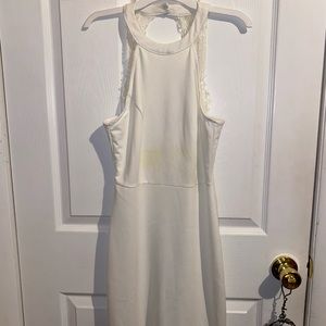 knee length open back dress halter neck